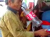 Coke bottle as trumpet Funny Asian videos