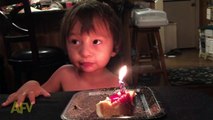 Boy Pulls Out All The Stops To Blow Out Birthday Candle !!