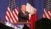 Donald Trump holds up water bottle on stage at Texas rally It’s Rubio!