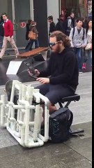 Funny: Street Performer with talent!.... and flip-flops