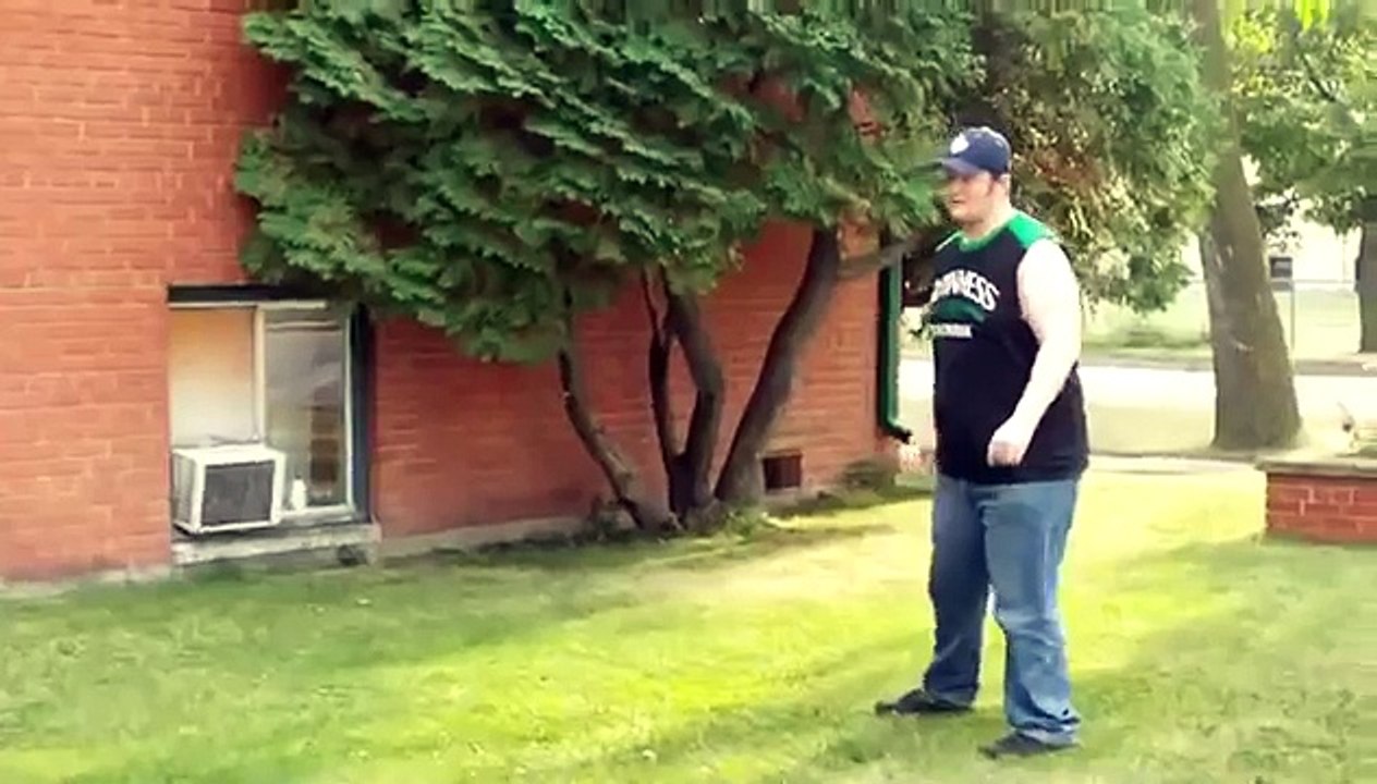 Fat Guy Fails at Kicking a Ball