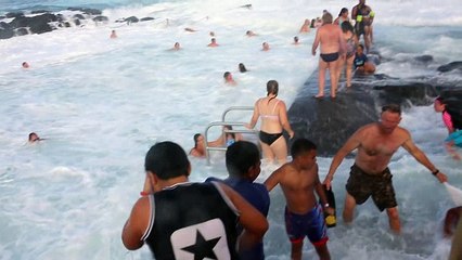 People getting smashed by huge waves in Kiama rock pool...