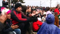 Migrants protest as thousands get stuck at Macedonian border