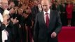 Vladimir Putin walks with a gunslingers gait, in which his right arm has little swing