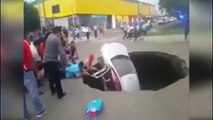 Sinkhole swallows car and family has to be rescued in Peru