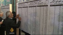 Iranians wait for final election results as reformists surge