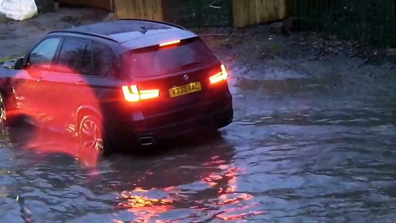 vehicles crossing a flooded ford 2016 - river crossing