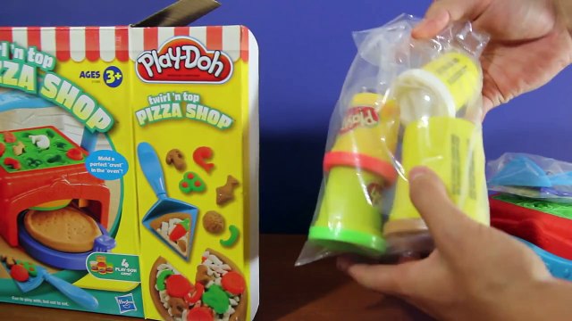 Play-Doh Twirl N Top Pizza Shop Toy by Hasbro featuring 4 fun play dohs and baking toy!