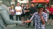 Douche gets punched by street performer!
