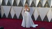 The stars walk the red carpet at the Academy Awards