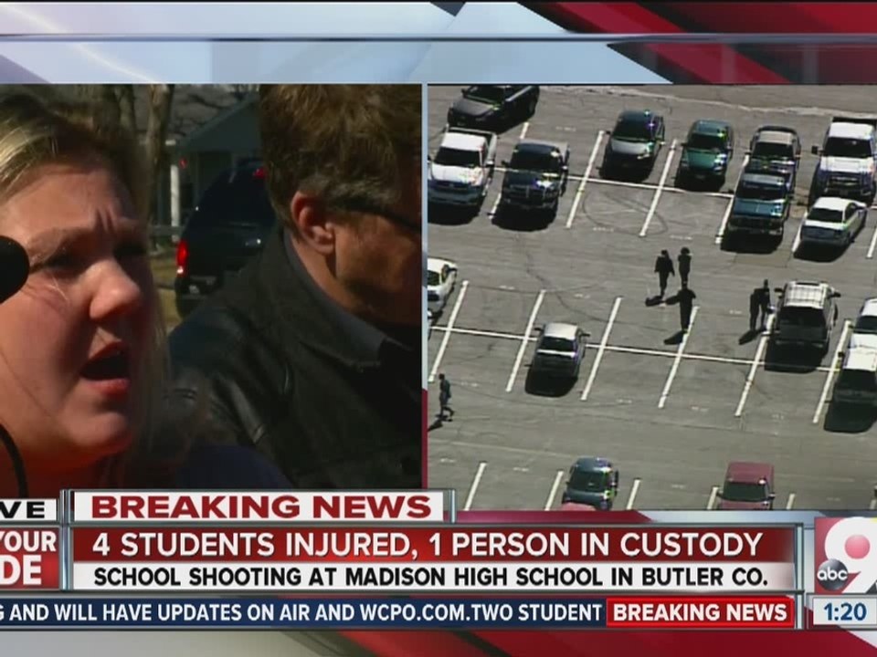 Madison High School's spokeswoman talks to reporters following a shooting in the Jr./Sr. High School