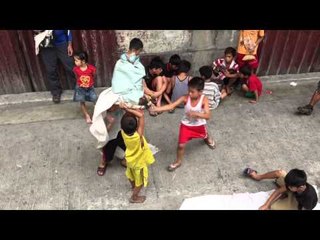 China town goes whoopee over street kids lion dance