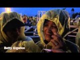 ‘Yolanda’ survivors chill in rain as they await Pope Francis’ Mass