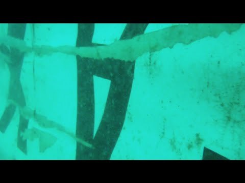 Tail of doomed AirAsia plane found