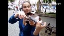 Playing violin, beautiful girl