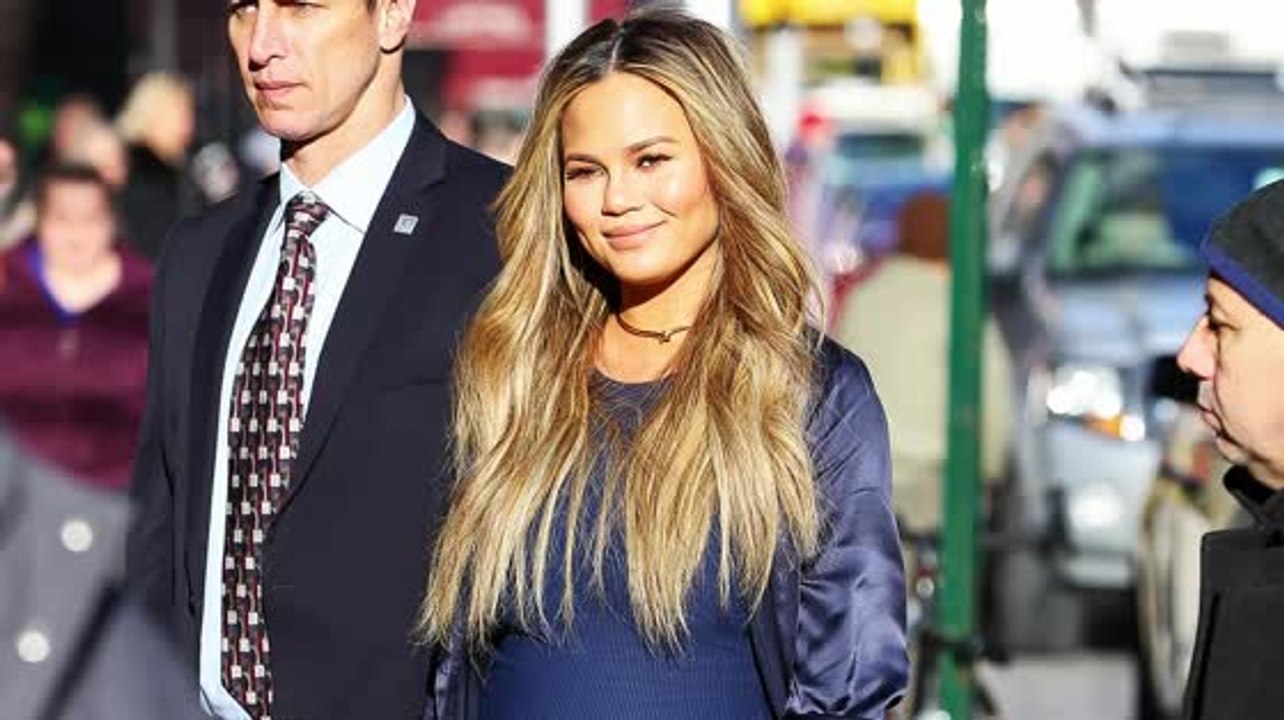 Chrissy Teigen Shows Off Baby Blues Maternity Style and Cooking Skills