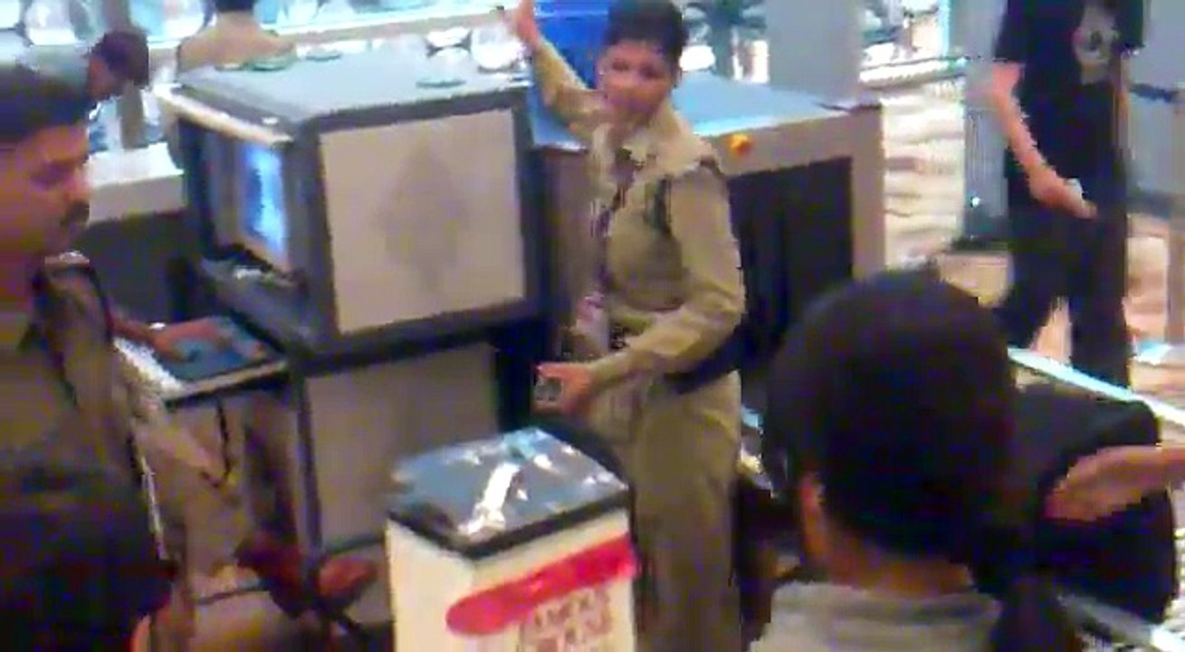 Treatment at Indra Gandhi International Airport New Delhi Security trying to nick Whisky b