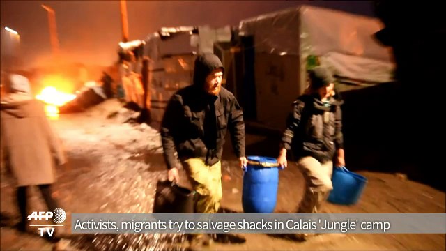 Activists,migrants try to salvage shacks at Calais 'Jungle' camp