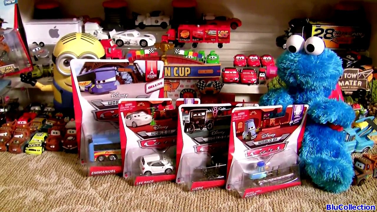 Cars Wheel Well Guido with Sign Team Lightning McQueen Emmanuel Parisian Tour Bus Lizzie Pixar