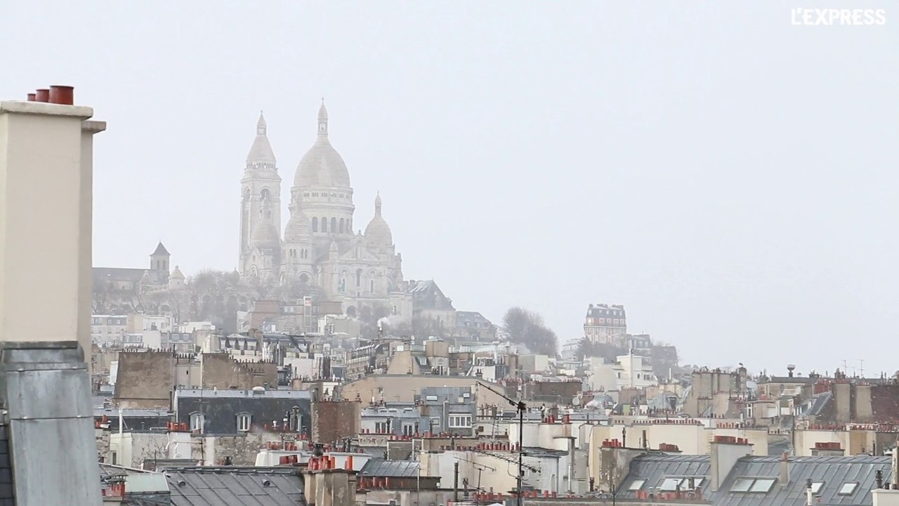 Premières chutes de neige de l'année sur les toits de Paris