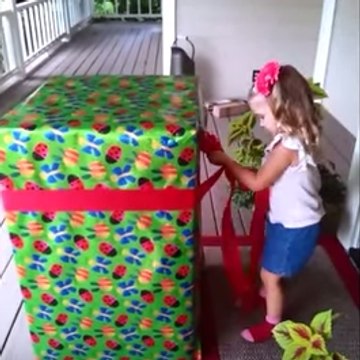 A three-year-old girl finds her father in her birthday gift