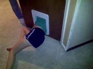 Girl stuck in cat door