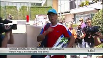 Rafa Nadal signing autographs for fans