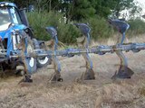 Powerful New Holland T8.390 ploughing