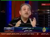 سيد القمني يشير الى السماء ويقول السيد الدكتاتور  على قناة الجزيرة