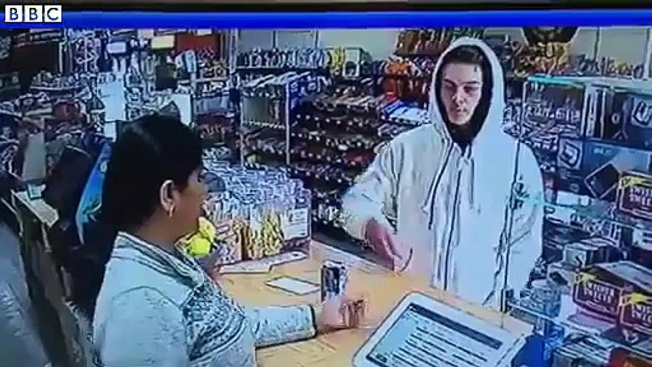 Cashier wrestles with armed robber