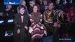 Proud mom Kris Jenner watches daughter Kendall at Elie Saab