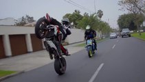 Two bikers wild freestyle in the streets of Lima, Peru