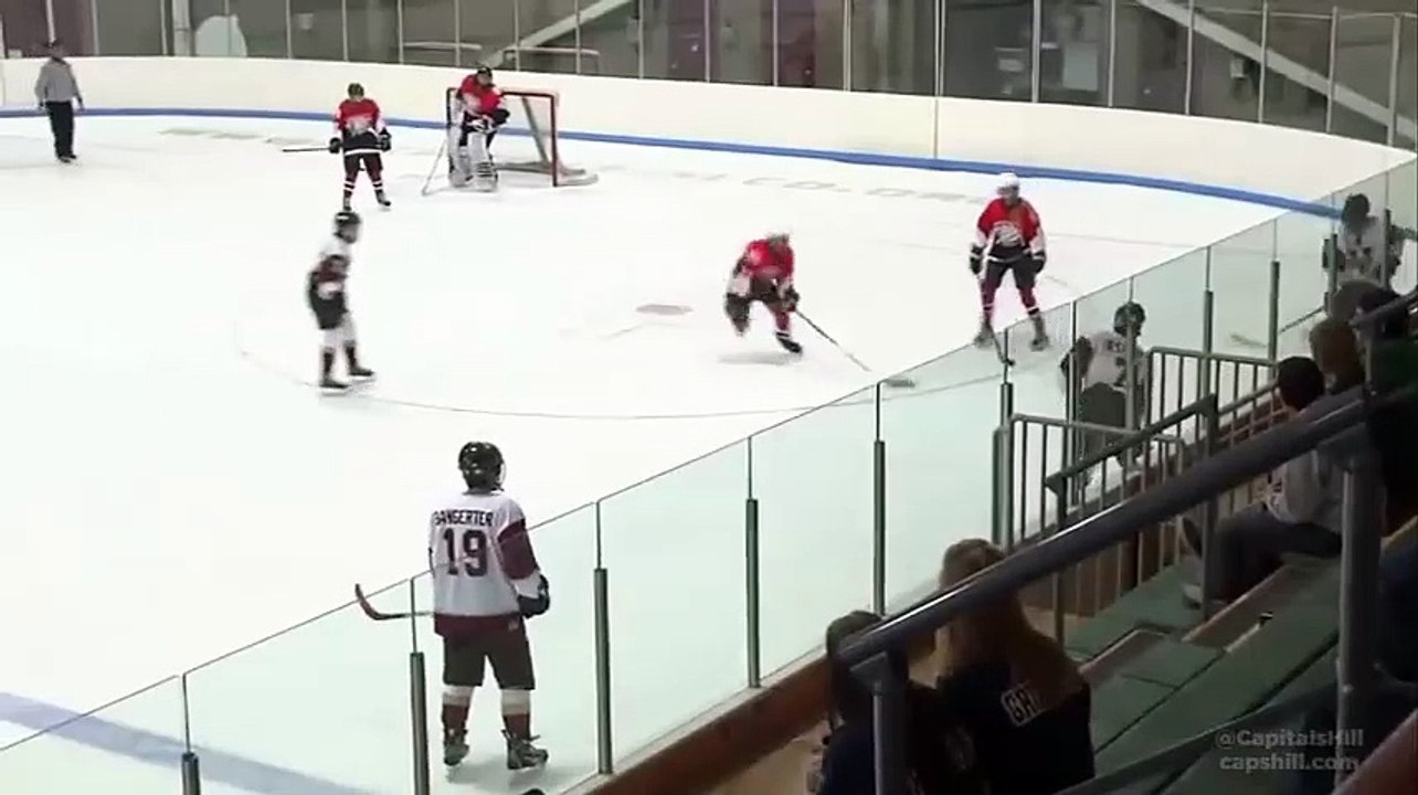 A hockey player avoids getting checked
