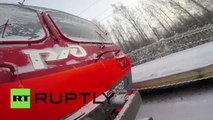 Adrenaline skiing: Crazy Russian daredevil ties himself to speeding train