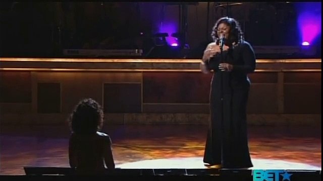 kim burell singing to Whitney Houston at BET honors