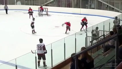 A hockey player avoids getting checked