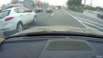 Car tries to change lanes with no room and ends up flipping over