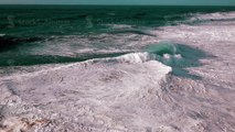 Slow Motion Ocean Waves Breaking on Shore