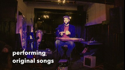 Michael Schenkel plays the dulcimer at Mohawk Place