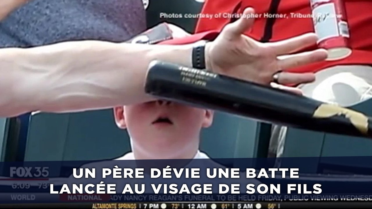 Un père dévie une batte de baseball lancée au visage de son fils