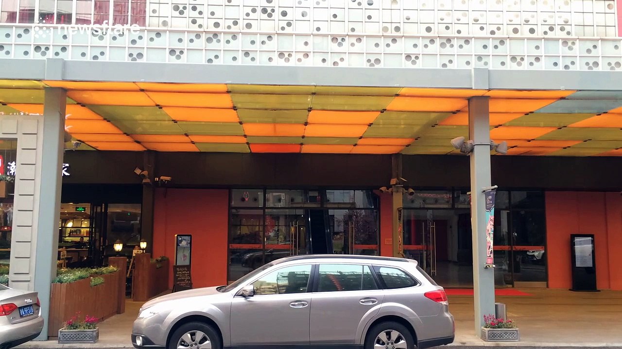 Building designed with bullet hole-like effect on the walls