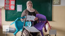 This school principal is helping Syrian refugee girls, one chair at a time