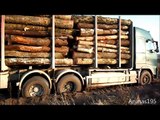 Fully loaded Volvo timber truck stuck in mud