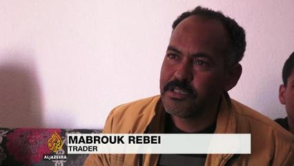 Tunisian families mourn losses after attack on town