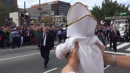 Pope embraces a Pope baby
