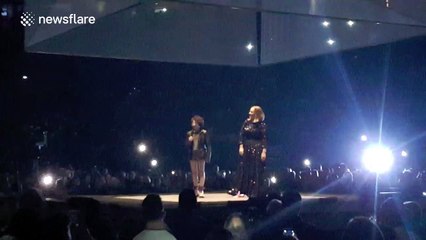 Adele invites impressive young fan onstage to perform in Manchester