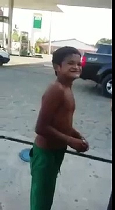 Brazilian boy picking his nose