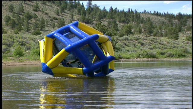 HydroBronc - human hamsters head for the rapids.