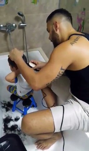 Papa's the barber... Gavin's new hair style