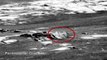 Two Figures Check Out Crashed UFO On Mars